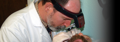 Dr. Airsoft operates on a patient's eye